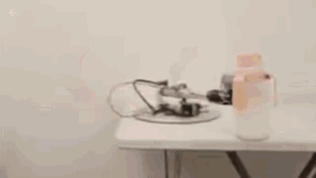 bottle.gif.c2aba32b097f2398f322f9095ade81dd.gif