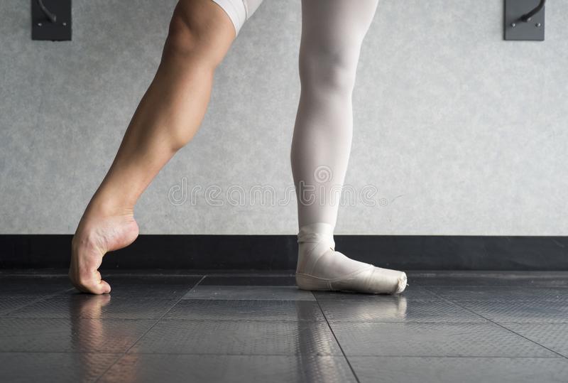 hardworking-disciplined-ballerina-ballet-dancer-warming-up-her-pointe-shoes-hardworking-disciplined-ballerina-ballet-119503553.jpg.9de82b139bf1e25761852755cb48bcb3.jpg