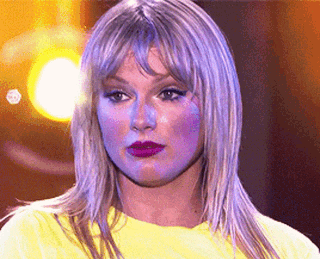 i-dont-know-taylor-swift-crop.gif.f7dba0a5adb17b535fd25e276068f129.gif